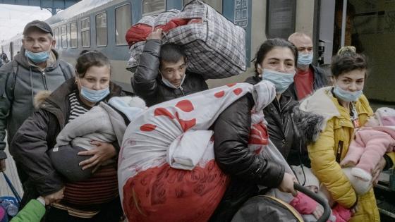 A refugee family from Ukraine arriving at a train station in Budapest 