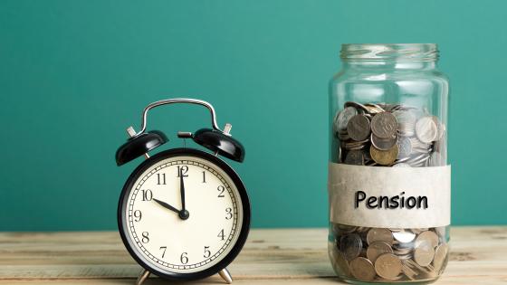 Alarm clock with jar of coins